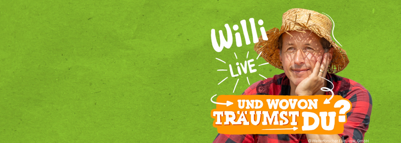 Mann im karierten Hemd mit Strohhot, der die Frage stellt: Und wovon träumst du?