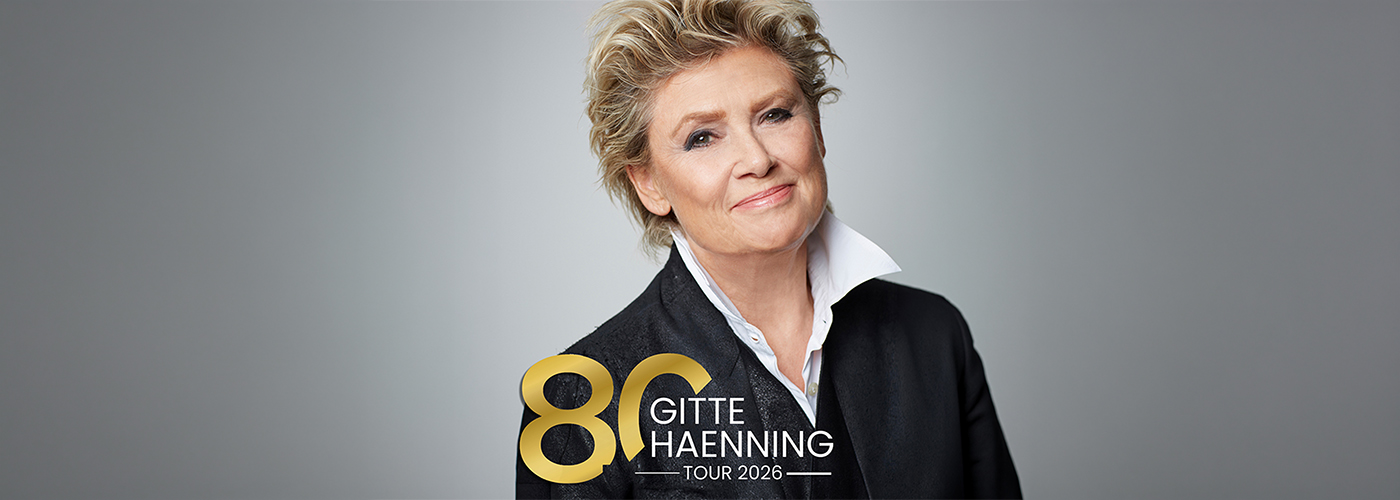 Pressefoto von Gitte Haenning auf grauem Hintergrund mit dem Titel "80 Jahre Gitte Haenning - Tour 2026"