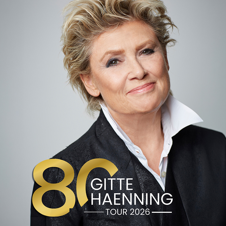 Pressefoto von Gitte Haenning auf grauem Hintergrund mit dem Titel "80 Jahre Gitte Haenning - Tour 2026"