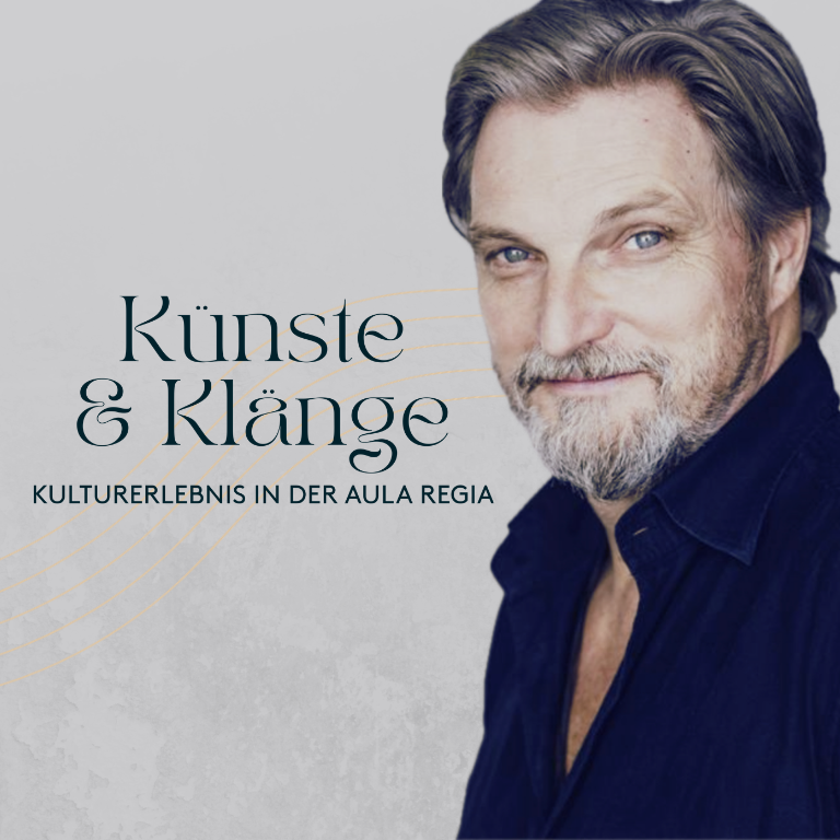 Stefan Jürgens blickt lächelnd in die Kamera